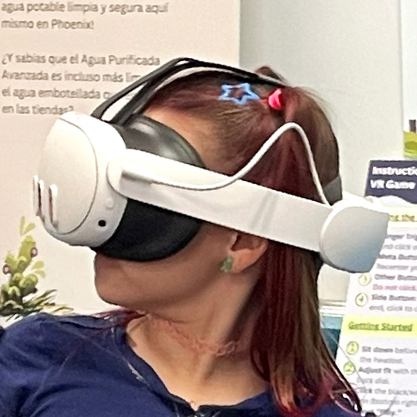 A girl wearing a VR headset.